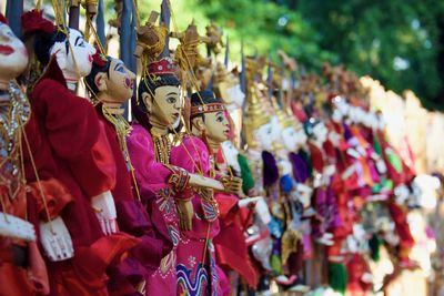 Close-up of puppets in market