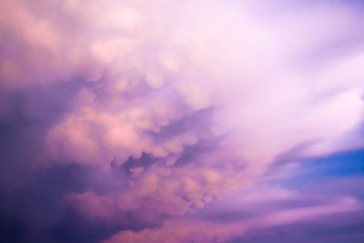 Low angle view of clouds in sky during sunset