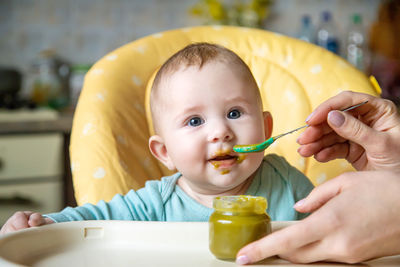 Close-up of boy eating food