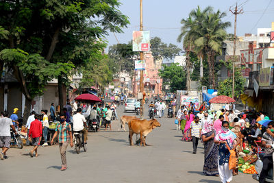 Group of people on street in city