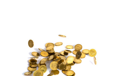 Close-up of coins on white background