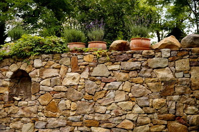 Stone wall against brick wall