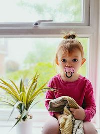 Portrait of cute girl at home