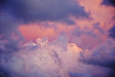 Low angle view of cloudscape against sky during sunset