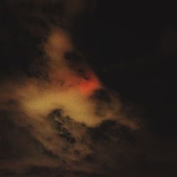 Low angle view of clouds in sky at night
