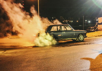 Car on road at night