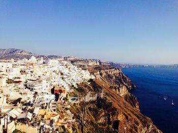 Panoramic view of sea against clear blue sky