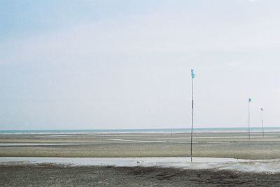Scenic view of beach against clear sky