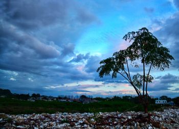 Scenic view of dramatic sky over landscape