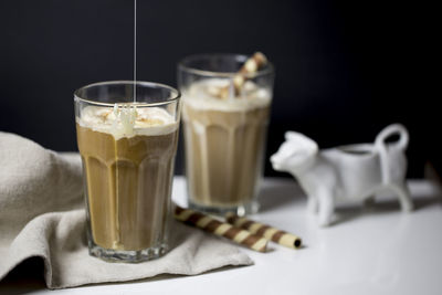 Close-up of coffee served on table