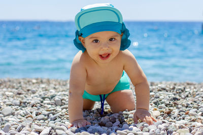 Portrait of cute boy on beach