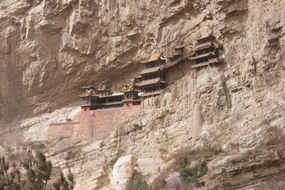 Wood buddhist temple in the rocks