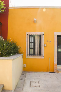 Yellow door of building