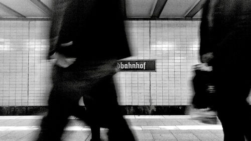 Blurred motion of people walking on subway station