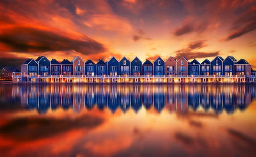 Scenic view of sea against orange sky