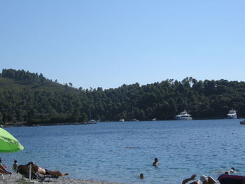 Scenic view of calm sea against clear sky