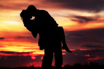 Silhouette of man at sunset