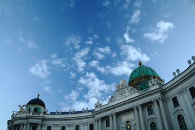 Low angle view of building against blue sky