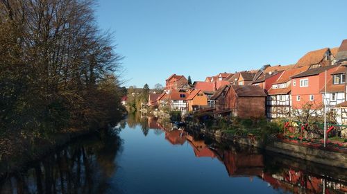 Canal amidst buildings against clear sky bad sonden-allendorf