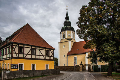 Exterior of historic building against sky in city