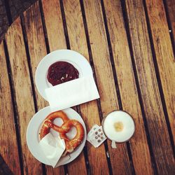 Directly above shot of coffee on wooden table