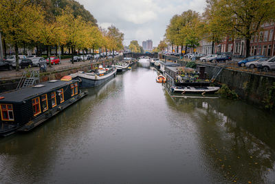 Boats moored in canal