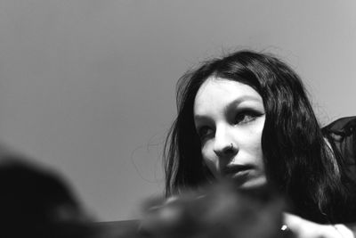 Close-up portrait of young woman