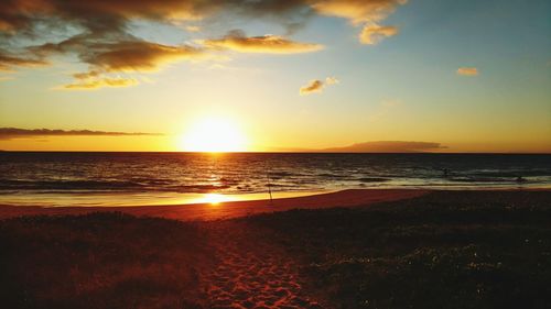 Scenic view of sea against sky during sunset