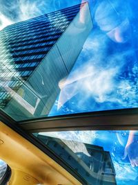 Low angle view of modern building against sky