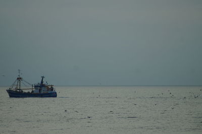 Scenic view of seascape against clear sky