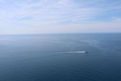 High angle view of boat sailing in sea against sky