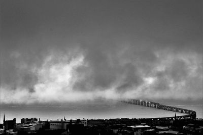 Storm clouds over sea against sky