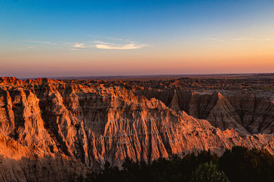 Scenic view of landscape against sky during sunset