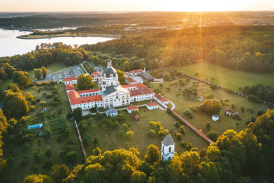 Aerial view of church against sky at sunset