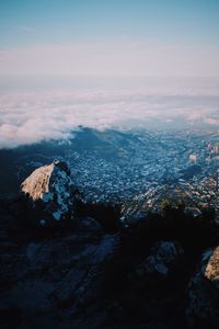 Aerial view of city against sky at sunset