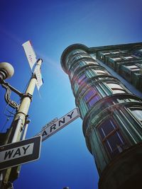 Low angle view of tower against clear blue sky