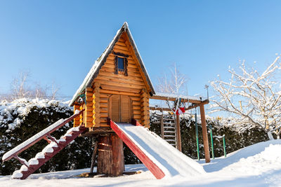 Low angle view of built structures against clear sky