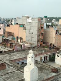 High angle view of townscape against sky in city