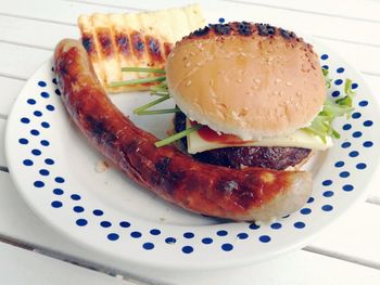 High angle view of burger in plate on table