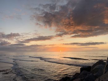 Scenic view of sea against sky during sunset