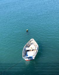 High angle view of boat moored in sea