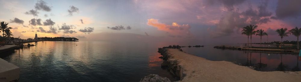 Scenic view of sea against cloudy sky