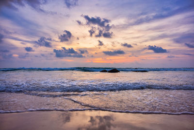 Scenic view of sea against sky during sunset