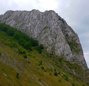 Low angle view of rocks against sky