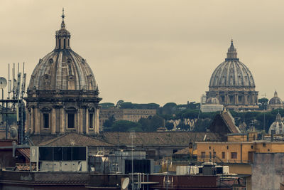 View of buildings in city against sky