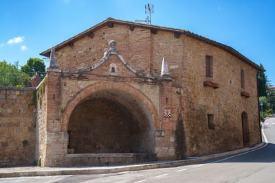 Low angle view of old building against sky