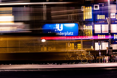 Light trails on street in city at night