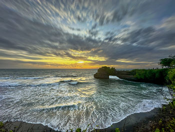 Scenic view of sea against sky during sunset
