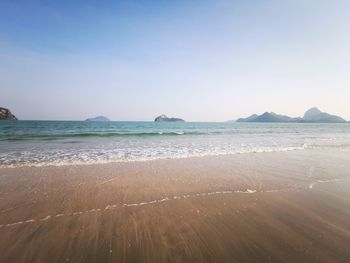 Scenic view of beach against clear sky