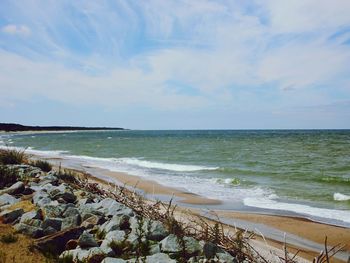 Scenic view of beach against sky